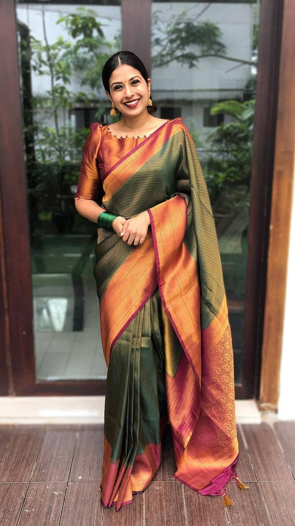 Supreme Soft SIlk Saree In Shine Green Color With Rich Golden Zari Weaving