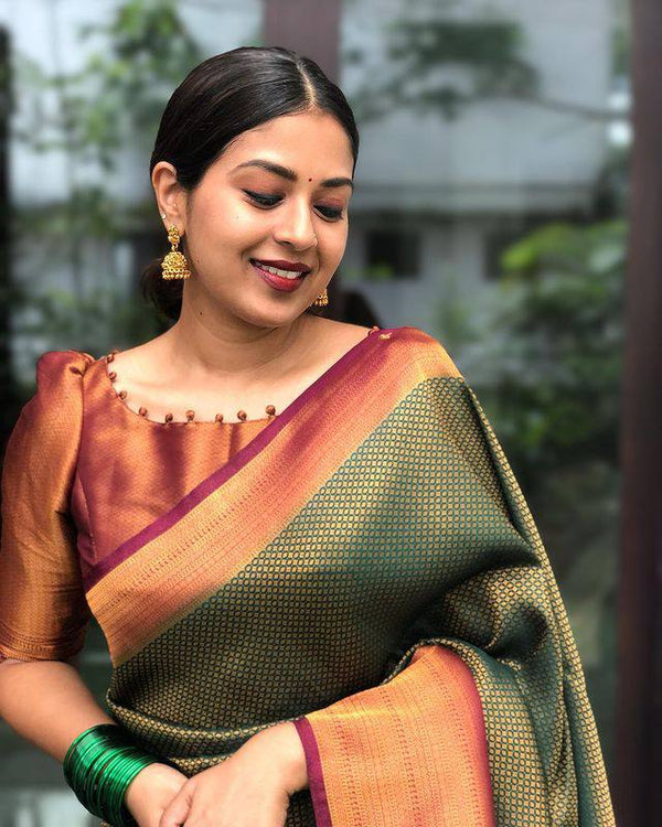 Supreme Soft SIlk Saree In Shine Green Color With Rich Golden Zari Weaving